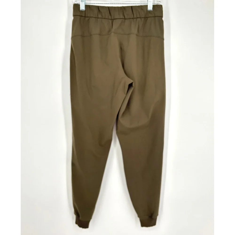 Lululemon‎ On The Fly Jogger 7/8 Mid Rise Olive Green Stretch Drawstring Size 6
